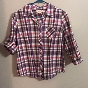 Plaid button up with button detail on back.